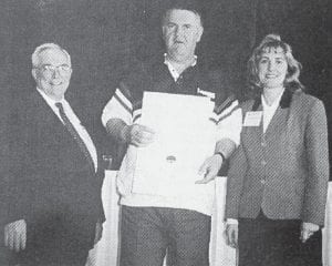 Walt Annerer of Grand Marais was recognized by the Minnesota Pollution Control Agency for outstanding performance of the operation of the wastewater treatment plant at Ryan Development on Lutsen Mountain. Annerer was one of 240 winners of an excellence award at the 59th annual wastewater operations seminar in Bloomington. Shown with Annerer, center, in this April 22, 1996 photo are MPCA Commissioner Chuck Williams and Division Manager Laurie Martinson.