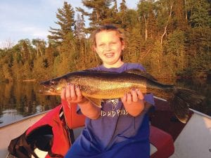 Katie Peck of Tofte had a great day of fishing on an inland lake recently with her dad, Captain Darren Peck.