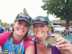 Fast frineds! Former Grand Marais resident Lori Yecoshenko (left) and Kathy Bernier finished the Garry Bjorklund Half Marathon together in 2:44:13.