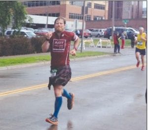 Right: Grand Marais Mayor Jay Arrowsmith DeCoux finished the marathon in 3:15:31.