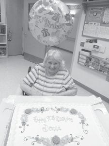 Donna Joynes Willett was all smiles when she celebrated her 90th birthday on June 24. Family members and the Care Center staff enjoyed a large cake with Donna.