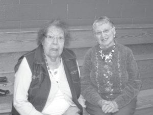 Above: The oldest community members, Doris Blank and Vera Amyotte take a break during the weekly Wisdom Steps walk. Left: Agatha and Vivian enjoying a moment at the Wisdom Steps conference.