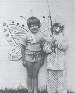 Winners in the Grand Marais Kiddie Parade were Darcy Peterson and Sarah Adams, who took first prize in the group division during the 1980 Fourth of July festivities. Other activities included races, a money hunt for pre-school children, an egg-throwing contest and three-legged and wheelbarrow races. In addition, the Lions Club carnival rides were set up by the lake, and fireworks were held at dusk.