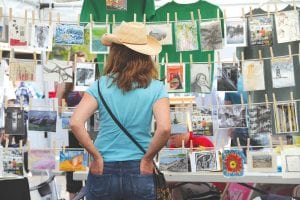 Decisions, decisions. The 25th anniversary of the Grand Marais Arts Festival, July 11-12, was another amazing event, with storytelling, music and theater in Harbor Park, live radio broadcasts, artist demonstrations and the ever-popular Clothesline Art Sale. See more Arts Festival on page A3.