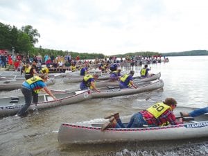 Go, go, go! It’s a mad dash at the start of each event at the Gunflint Canoe Races. Held Wednesday, July 15, this year’s event saw record attendance and the weather was perfect. See more canoe race excitement on page B1.