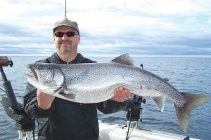 Jim Schmidt of Lutsen had a fabulous day on the lake on Thursday, June 18. Fishing with Captain Darren Peck of Tofte Charters he caught this beautiful 16-pound lake trout.