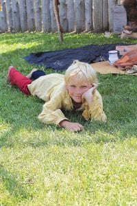 There is much to see and do at Rendezvous! Far left: A young voyageur relaxing between activities.