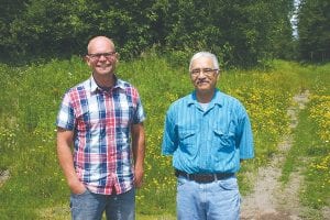 Dr. Seth Moore and Tony Swader, Grand Portage Trust Land Administrator, are working to create better habitat for moose in Grand Portage.