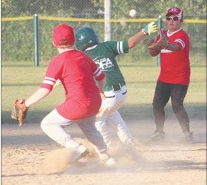 Wei-Lani Likiaksa gets ready to catch the ball and apply the tag to this Cubs’ player caught in a run down.