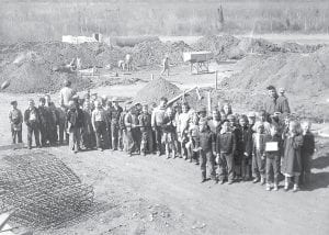 This undated photo from the files of former News-Herald editor Ade Toftey shows first- and second-graders visiting the construction site where their new high school was being built, and was probably taken sometime in 1952. According to News-Herald accounts, bids for the new Grand Marais high school were opened Sept. 8, 1951, and low bids totaled $487,000 for a building including an auditorium and gymnasium. Architectural fees and equipment brought the project total to a little over $500,000, to be paid in part by a $300,000 bond issue that was approved by voters 632-616 in the fall of 1950. The new school opened its doors to students in January 1953.