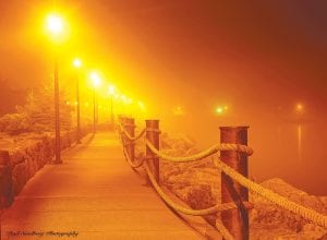 Fog has been hugging the shoreline in recent days. Paul Sundberg captured the lovely lights along the Lake Superior walkway in Grand Marais in a golden mist. The weather has been warm enough to enjoy night strolls.