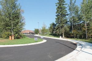 There is a change in the traffic flow at Cook County Schools (ISD 166) this fall. This new driveway, across the road from St. John’s Catholic Church, will be a one-way entry point.