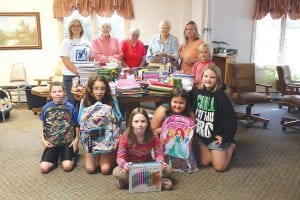 During the month of August donations of school supplies were collected by seniors and staff at the Senior Center in Grand Marais. On Friday, September 4, Anna Sandstrom, the ISD 166 Student Success Coordinator happily accepted the supplies. Several local school students helped take inventory and pack the items to be taken to ISD 166. Everyone was excited about the new school year beginning. (L-R, seated) Isaac Sandstrom, Christianna Mendivil, Kylie Viren, Sienna Deneweth, Sadie Wilson. (L-R, standing) Anna Sandstrom, Gladys Anderson, Linda Johnson, Betty Larsen, Jes Rodne, Rayce Gibson. See more about the school supply collection on page A5.