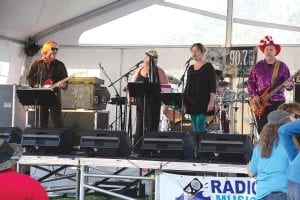 Earth, Wind and Todd, the North Shore’s “groovy” ‘70s dance band rocked the tent on Saturday evening. Band members at Radio Waves were Todd Miller, Amy Brooks- Varga, Amanda Hand, John Mianowski and drummer John Varga.