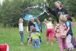 Although the focus of the Radio Waves Music Festival is the 30-plus bands and solo artists that appear under the big tent at the Grand Marais Recreation Park, there are also activities for kids who attend. The giant bubbles floating around the grounds on the afternoon of Saturday, September 12 were a huge hit. See more about Radio Waves on page B3.