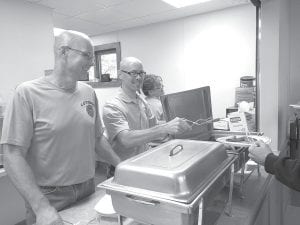 The Lutsen Volunteer Fire Department once again hosted it fabulous fall pancake breakfast on Sunday, September 20. The town hall was filled with folks enjoying the pancakes made from former firefighter Sonja Helland’s secret recipe pancakes with maple syrup made locally. Matt Farley watches as Lutsen Fire Chief Paul Goettl serves up some sausages to a happy customer. The money from the pancake breakfast benefits the Fire Department Relief Association.