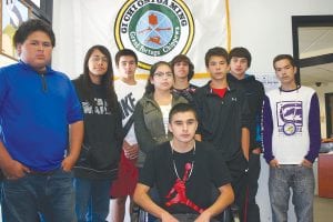 A group of Ojibwe students from Cook County High School attended the most recent county board meeting with a request that the county proclaim Monday, October 12 as Indigenous Peoples’ Day instead of honoring it as Columbus Day. The Cook County Board of Commissioners voted 3-2 to retain Columbus Day. (L-R) Joe Deschampe Jr., Jaden Aubid, Dyami Blackwell, Samantha Scalise, Michael Hendrickson, Trusen Gordon, Marcus Logan, Brent Sorenson. Seated: David Logan.