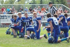 The 4-2 Vikings took a knee during an injury timeout during a recent home game. (L-R) Sam O’Phelan, Owen Anderson, Will Lamb, Rory Bakke, Dylan Works, Andrew Lashinski, Leo Johnson, and Frankie Miller.