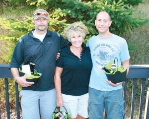 Left: Finishing in second place was the Fenwick No. 2 team of (L-R) T.J. Tozzel, Linda Fenwick and Greg Adams. Not pictured is Chris Fenwick