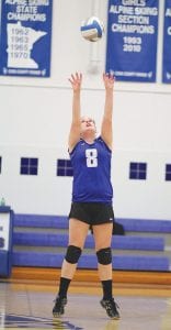 Getting ready to make another set assist, Alex Slanga sends the ball to her very tall front court players in the match against Silver Bay. Slanga finished the match with 15 set assists.