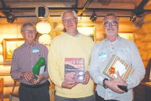 Left: Outgoing Community Fund Board Members Mike Carlson, Howard Hedstrom, and Richard Anderson received a special gift, a copy of North Shore: A Natural History of Minnesota’s Superior Coast. Above: Foundation Board Members Tracy Benson and Sue Riley enjoyed visiting with guests at the event at which $19,385 was granted to community nonprofits.