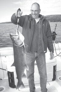 Dave Wanous from Lutsen with a 19-pound, 38-inch lake trout caught on Saturday September 12 while fishing on Lake Superior with Tofte Charters. The lunker was released.