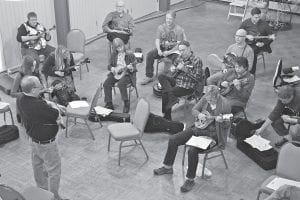 For a quarter century, bluegrass musicians have been gathering for the Bluegrass Masters Weekend on the first weekend in November. The weekend includes workshops like this one in the resort ballroom. The featured instructor for 2015 is Mike Witcher and the featured instrument is the dobro.