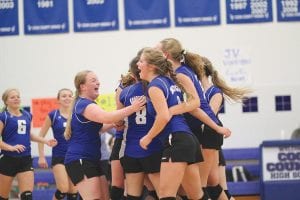 How good does it feel to win 20 games straight? The hard working Viking volleyball team celebrates after a recent win. If the team wins on Thursday, October 22, (after press time) they will be the first volleyball team to go undefeated in Cook County High School history. And that should make every Viking fan smile!