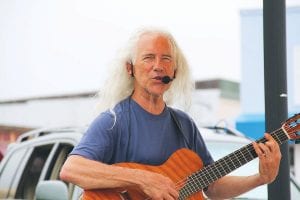 This summer Michael Monroe, the talented and popular local singer-songwriter was recognized at the LaCrosse, Wisconsin’s Great River Folk Festival.