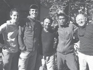 Bridget Schletty, Elias de Andres Martos, Lonnie Dupre, Furba Tamang and Buck Benson pose for a picture in Nepal. Dupre is leading a mission there to gather scientific information about global warming and to provide humanitarian relief.