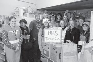 National Honor Society members and their friends joined the other goblins traipsing through the fog and knocking on doors Halloween evening. This year’s “Trick or Can” event added 266 pounds of food to the local food shelf, thanks to the generosity of local donors. (L-R) MaeAnna LaFavor, Isaac Terrill, Joe James, Alex Slanga, Lucas Phillips, Rory Bakke, Bergen Soland, Madison Roy, Lily Gruber-Schulz, Sara Carman, Owen Anderson, Emily Jacobsen, Marin Hay, and Matea Acero.