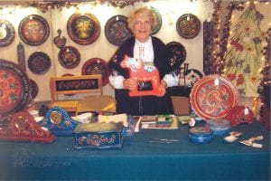 Mary Schliep of Grand Marais at Norsk Hostfest in Minot, North Dakota. Schliep received a Merit Award at this year’s Scandinavian festival. She is holding the award, a colorful Dala horse.