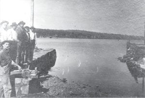 This photo from the Cook County Historical Society records some work being done at the “Hovland dock.” The note on the photo lists the workers as (L-R) Hilmer Nelson (front), Nels Myhr, George Eliasen, John Myhr, Ludwig Eliasen, Hjalmer Eliasen.