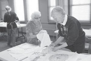 The lefse ladies at Bethlehem Lutheran Church have been hard at work making the traditional lefse served—and sold—at the Julefest celebration. Gladys Dockan and Sally Arntsen prepare to package the Scandinavian treat.