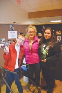 Three seniors were recognized for their work with Grand Marais Playhouse on Sunday, November 22 after the last showing of As You Like It. (L-R) Sam Kern, Shae Morawitz and Erica Marxen.