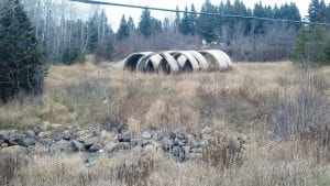 Ten sections of a very large culvert were placed on this county-owned property next to Flute Reed River in 2006 and residents of Hovland would like the county highway department to remove them. The sections can be seen from the road and are considered an eyesore. Despite repeated requests, the highway department hasn’t moved them because it will cost about $20,000.