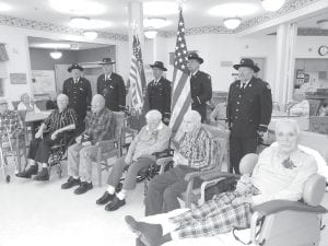 There was a lot to celebrate at the Care Center in November. The American Legion Post 413 Honor Guard visited the Care Center to honor the veteran residents on Veterans Day. (L-R, front) Robert McClanahan, Don Sorlie, Bob Heideman, Sweeney Croft, and Darold Larson. (L-R, back) Bob Mattson, Don Wilson, Orvis Lunke, Ron Wilson and James Ford.