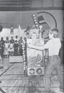 The Christmas concert at Sawtooth Elementary in December 1985 featured costumes, skits, singing and music. The Dec. 19 issue of the Cook County News-Herald called the second graders’ singing and performance of The Marvelous Toy as “the hit of the night.” The skit featured a song about a young child who gets a toy that can only be described as “marvelous” because nobody has any idea what it is supposed to be. Jeremiah Yeary is seen here in his box-shaped costume, portraying the toy that makes all sorts of funny noises and movements.