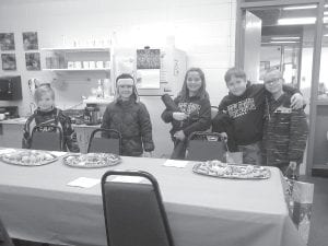 Local kids stopped by to enjoy lunch—and cookies!—at Birch Grove Senior and Children's Lunch on December 9.