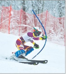 The Cook County Alpine Ski Team had a stellar showing at the first Arrowhead conference race of the season at Giants Ridge on December 18. Both the boys’ and girls’ Alpine teams captured first place. Left: Junior Will Lamb led his team to victory at the Virginia Invite. Above: Alyssa Martinson carried a lot of speed at the bottom of the headwall, finishing in an impressive 5th place!