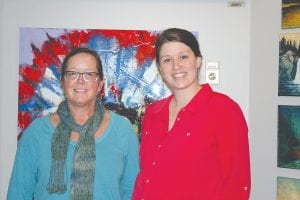 Kah-Nee-Tah Gallery owner and employees have been busy bringing in new artwork and setting up the displays that make the gallery such an inviting place for customers. Left: Owner Linda Garrity and sales and operations manager Danielle Fortin. Above: Hand carved and painted Native American art by Susan Zimmerman.