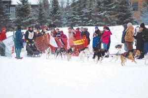 The field is filling up fast for the 2016 Gunflint Mail Run Sled Dog Race. The mushers—like Odin Jorgenson, pictured here taking off in 2012—will depart from Trail Center the morning of Saturday, January 10th and return to rest for a layover the same day. They will depart and finish at Trail Center the next day with the winner determined by adding up the two-day finish times.