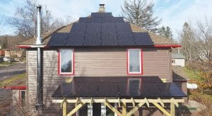 Solar panels adorn the roof of Jay and Rose Arrowsmith DeCoux’s Art House Bed & Breakfast. The couple is the first in Grand Marais who will be able to generate solar power and (potentially) sell power back to the grid.