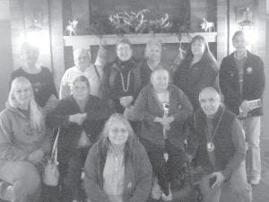 A number of Grand Portage Elders and friends enjoyed a trip to Duluth for shopping and a tour of Glensheen Mansion before Christmas. (Front) Hattie Papion. (L-R, second row) Missy Ullman, Doris Blank, Dottie Griffith, Dido Swader. (L-R, back) Carol Hackett, Ellie Olsen, Patty Winchell-Dahl, Vivian Carlson, Ellie Altman, Rita Ann Larsen. (Not pictured David Deschampe, Ellen Olson, Ralph Tesser and Darlene LeGarde.)