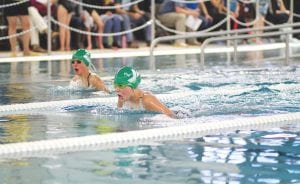 Ella Hedstrom (right) and Louise Ramberg were neck and neck in the 50-yard breaststroke competition held at the Cook County Community YMCA pool on January 23. Ella won this race and qualified for the regional swim meet where she will compete against some of the fastest swimmers in the Midwest. Participants came from Duluth and Superior to compete in the meet that had over 100 participants ranging from elementary school-aged children to adults in their 60s. See more on page B1.