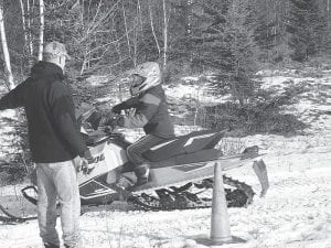 Field testing for the 2016 youth Snowmobile Safety course was held in December at the old airfield on Devil Track Lake. Students learn about snowmobile operations and drive through an obstacle course.