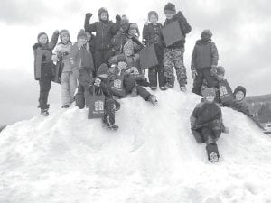 There is always something happening at the Cook County Senior Center. Students in the Intergenerational Reading Friends program visited the Senior Center on February 5 to read with seniors. The students from Jana Larson’s 4th grade class ended their visit with some fun on the large mountain of snow outside of the Senior Center.