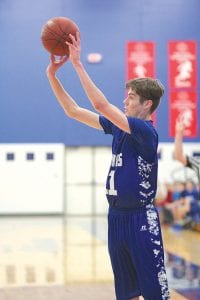 Lucas Phillips sends up a shot from long range. Phillips, a rangy 6’3” forward, scored 9 points against Esko to lead the team in scoring.