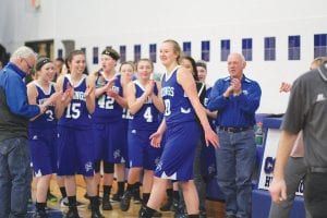 The ceremony was brief, but when Lily Gruber-Schulz pulled down her 1,000th rebound, the game against Moose Lake/Willow River was stopped and fans stood and cheered to acknowledge Gruber-Schulz for passing another great milestone in her senior year.