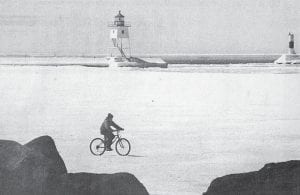 The winter of 1996 had plenty of cold weather, as evidenced by this photo of a bicyclist traveling across the frozen harbor in Grand Marais – on April 9! How cold was it? Nighttime lows in town between Jan. 25 and Feb. 4 were well below zero degrees every night except two, with the mercury bottoming out at 32 degrees below zero on Feb. 2. At Poplar Lake, the recorded low temperature that night was even lower – minus 42 degrees. Now that’s c-cold!